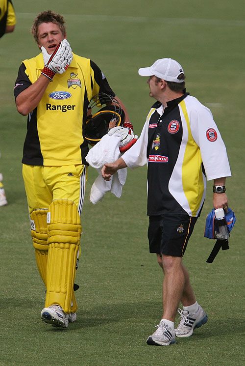 Matt Johnston leaves the field with a broken jaw