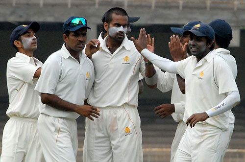 NC Aiyappa and his team-mates celebrate the fall of M Vijay for 32