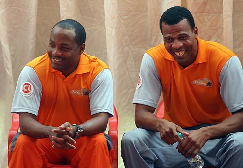 Brian Lara and Mervyn Dillon of the ICL Mumbai Champs address the media