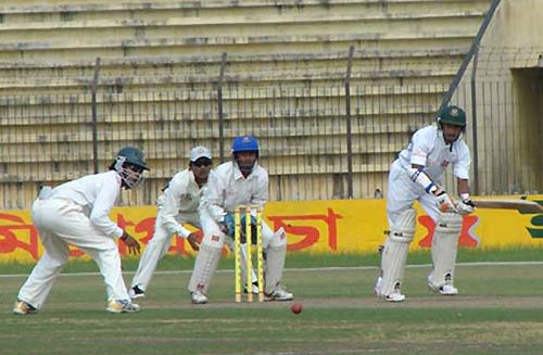 Khulna's Nazmus Sadat turns the ball to the on side during his 61