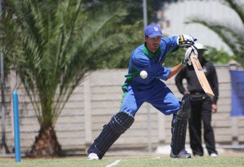 Namibian captain Bjorn Kotze cuts the ball