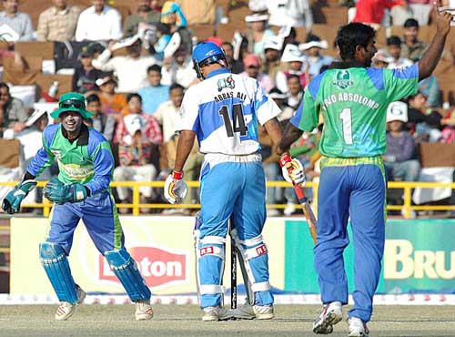 Alfred Absolem and Ibrahim Khaleel celebrate the wicket of Abbas Ali