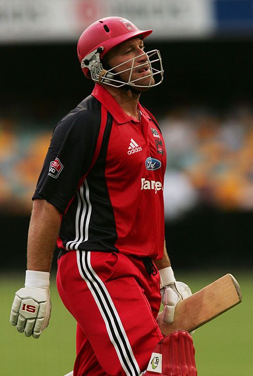 Shane Deitz walks back after being caught off James Hopes for 32