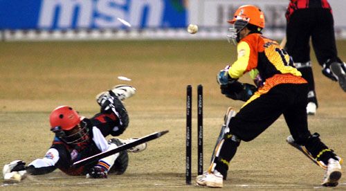 Mihir Diwakar of the Kolkata Tigers is found short of his crease