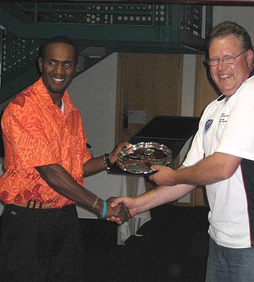 Andrew Mansale receives his Player of the Tournament trophy for his allround efforts which helped Vanuatu qualify for the WCL Division 5