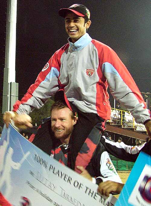 Man-of-the-Match Sujay Tarafdar rides on Lance Klusener's shoulders