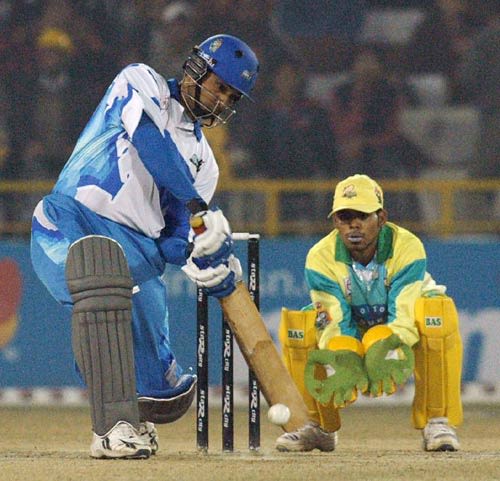 Abbas Ali is poised to wallop the ball
