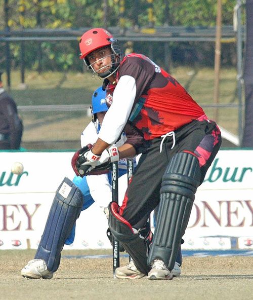 Shibsagar Singh prepares to launch the ball into orbit