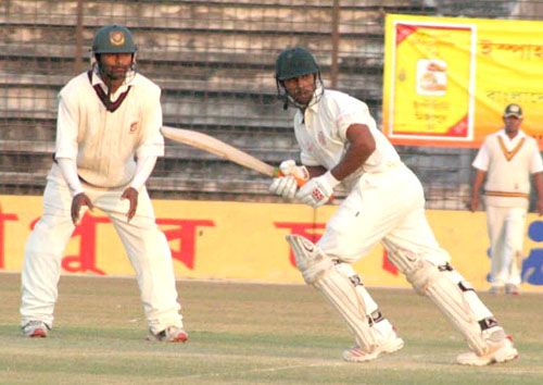 Rajshahi's Farhad Hossain scored an unbeaten 57