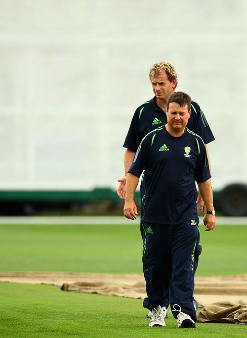 Paul Reiffel and John Ward inspect conditions
