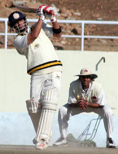 Ajay Mannu of Himachal Pradesh hits out during his 103