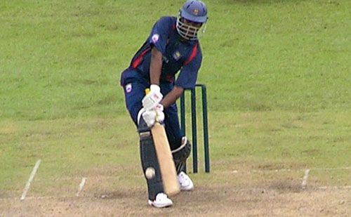 Man-of-the-Match Nuwan Zoysa smashes a six during his 29-ball 48