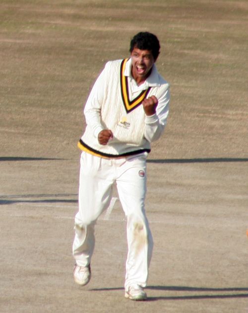 Vishal Bhatia exults after claiming a wicket