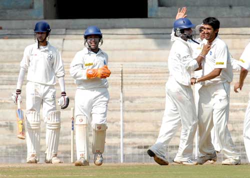 Legspinner Chetanya Nanda celebrates after bowling K Vasudevadas