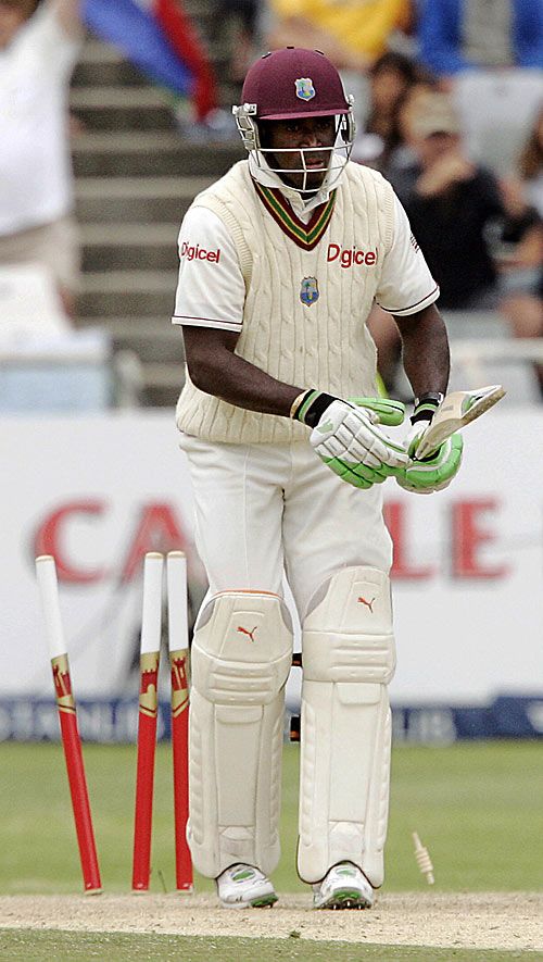 Rawl Lewis is clean bowled by Dale Steyn