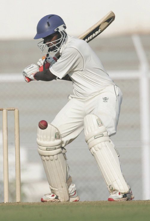 Harshad Rawle prepares to cut the ball
