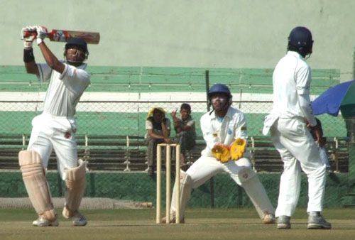 Baroda's Shatrunjay Gaekwad lofts over over the infield