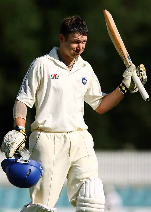 John Rogers walks off after scoring 98