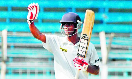 Tanmay Srivastava signals to the dressing room during the course of his century