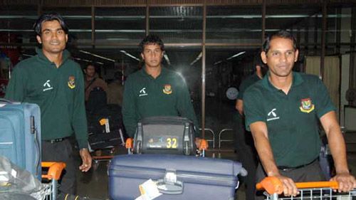 The Bangladesh players walk out of the terminal