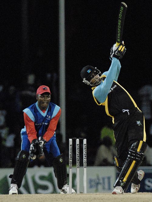 Cletus Mathurin powers the ball down the ground during his 47-ball 39