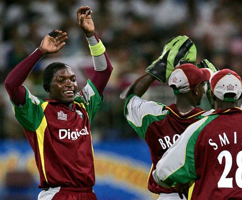 Fidel Edwards and Patrick Browne celebrate the wicket of Jacques Kallis