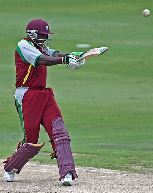 Rawl Lewis prepares to pull a huge six