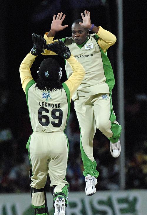 Calvin Lewis celebrates one of his three wickets