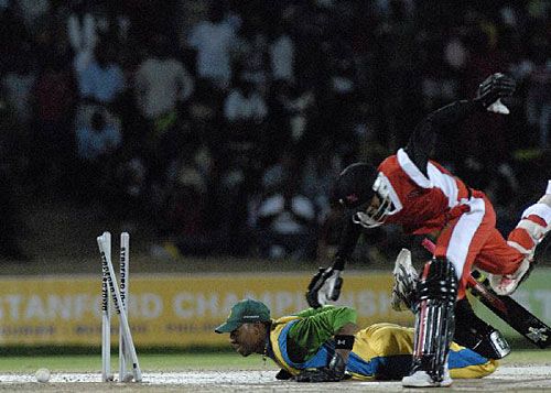 Lyndon James runs out Denesh Ramdin