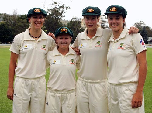 Emma Sampson, Leonie Coleman, Ellyse Perry and Kirsten Pike pose after receiving their caps
