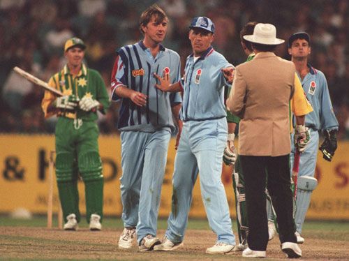 Alec Stewart steps in to prevent any argument between Phil Tufnell and umpire Tony McQuillan