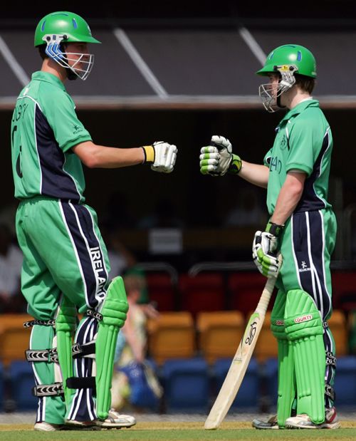Christopher Dougherty and Graham McDonnell punch gloves