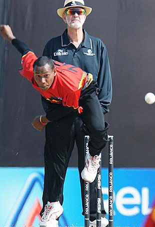 Willie Gavera bowls against India