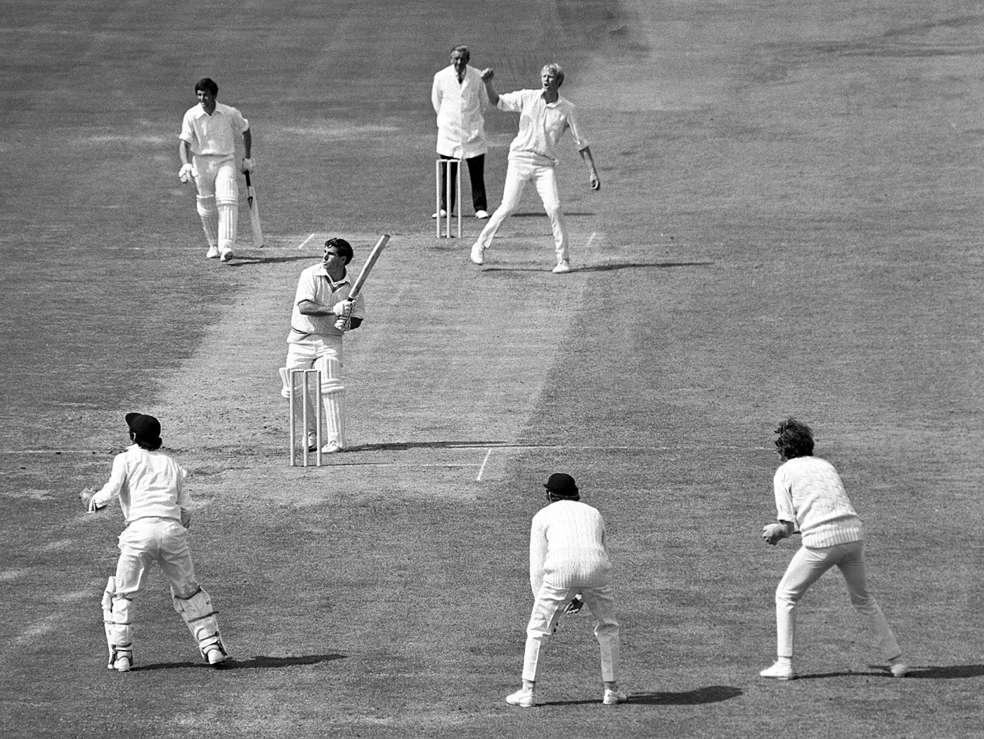 Vic Pollard hooks Tony Greig to the boundary,