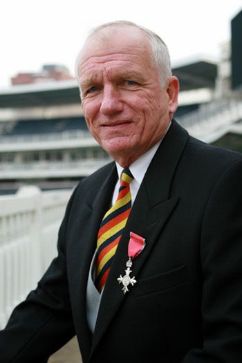 Clive Radley proudly displays his MBE
