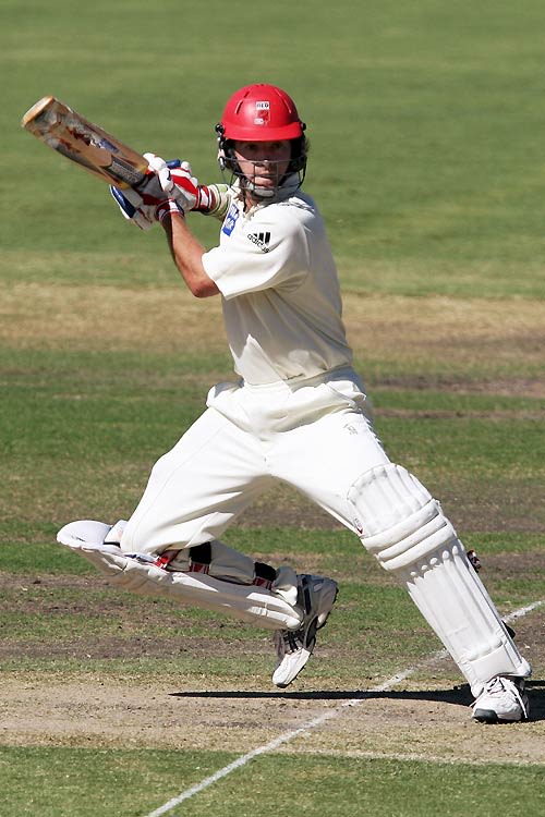 Mark Cleary slices one through the off side during his 57