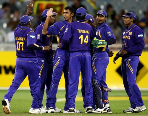 Ishara Amerasinghe is congratulated on the wicket of Mitchell Johnson