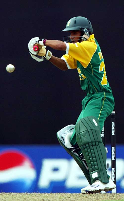 Yaseen Vallie guides the ball away