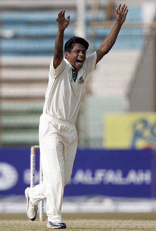 Mohammad Rafique celebrates his 100th Test wicket