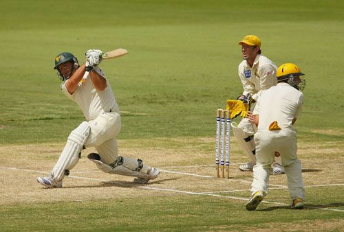 Daniel Marsh pushes the ball toward long-on