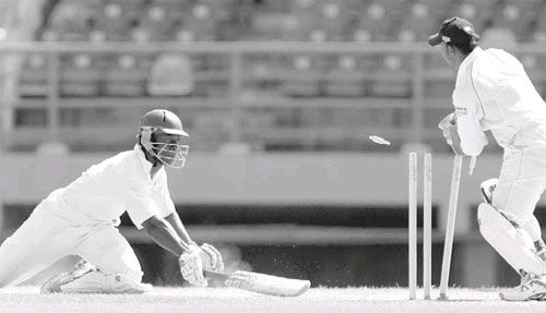 Jason Haynes is run out for 61 by Prasanna Jayawardene