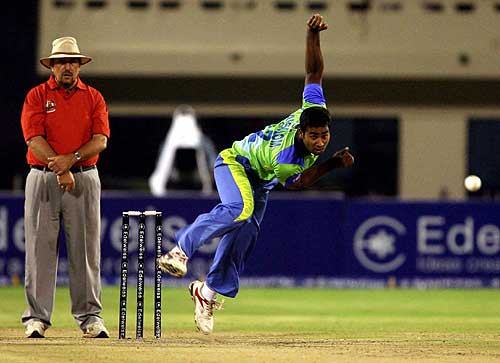 Alfred Absolem bowls against the Chandigarh Lions