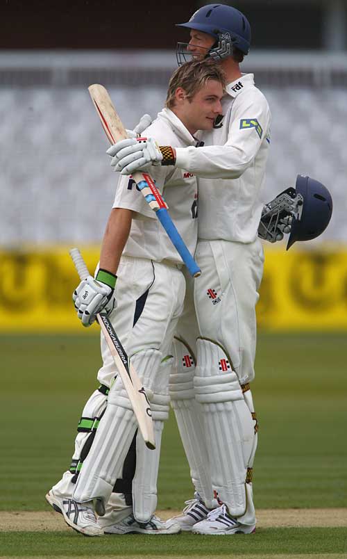 Luke Wright celebrates his century with Robin Martin-Jenkins