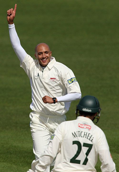 Garnett Kruger celebrates the wicket of Daryl Mitchell