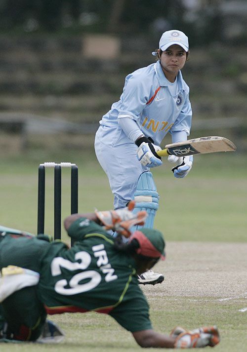 Jaya Sharma looks back as Irin Sultana stops the ball