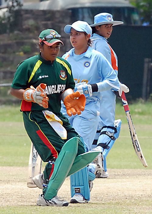 Irin Sultana waits to collect the ball