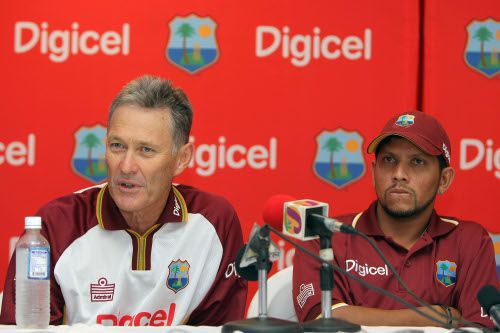 John Dyson, West Indies' coach, makes a point while Ramnaresh Sarwan looks on