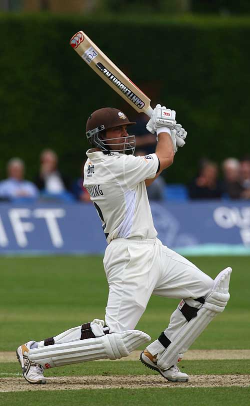 James Benning unleashes a square drive to steady Surrey's innings
