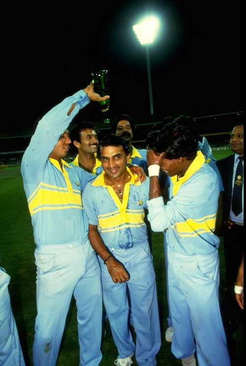 The Indian team celebrates winning the World Championship of Cricket