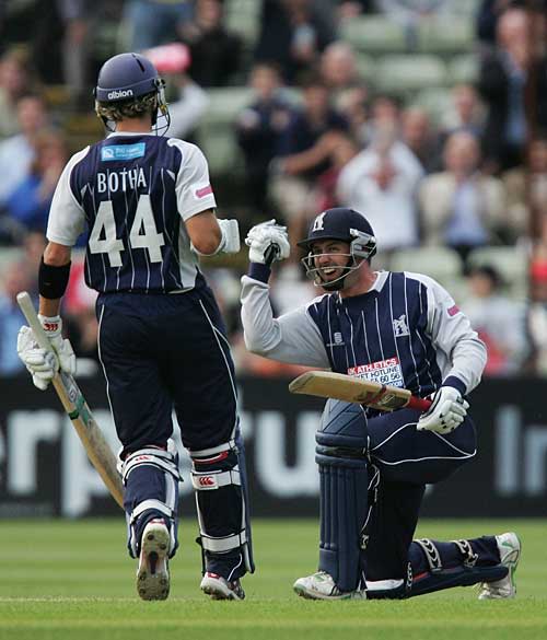 Michael Powell celebrates the winning hit against Somerset